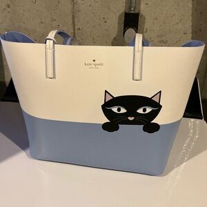 Kate Spade Peeking Cat Tote, leather 
Little Len
Wrap Things Up
Like New Cond